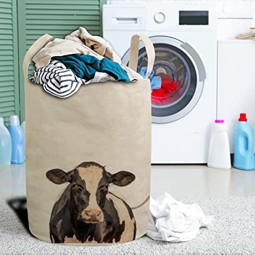 Roupa de cesta de cesto de lavanderia dobra de vaca isolada cesto de roupas sujas de roupas de linho de linho à prova