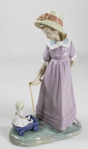 Estatueta colecionável de bonecas puxando lladro