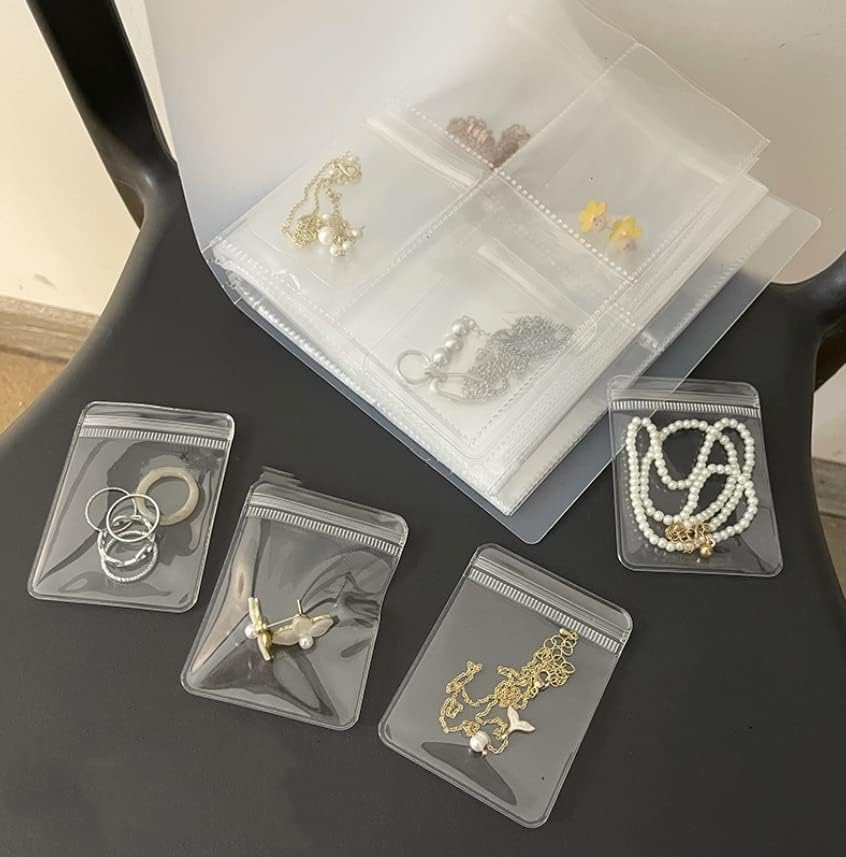 Livro de armazenamento de jóias Rikyo com bolsos, 100 PCs 2x3 Bolsas de armazenamento de jóias claras, álbum de armazenamento de jóias portáteis de viagem com anéis, colar, pulseiras, brincos, cartões bancários, cartões de visita