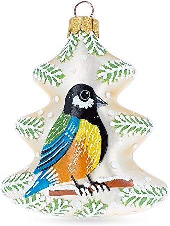 Pássaro colorido no enfeite de Natal de vidro da árvore de Natal
