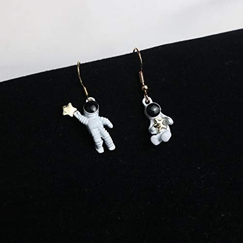 18K Gold banhado 3D Astronautas brancas e espaçadoras dolormolas de charme de estrela dourada, brincos de borla