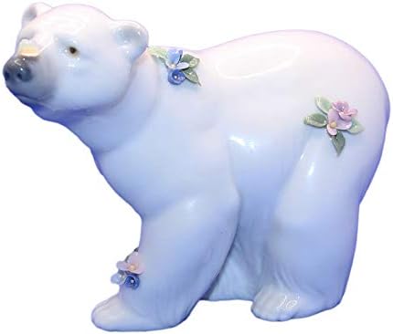 Urso polar atencioso e atencioso com flores estatuetas